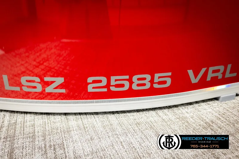 Slide: The Image of Red Avalon LSZ 2585 VRL boat, 2026 model, with Reeder-Trausch Marine logo. - 49