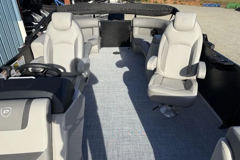Slide: The Image of 2026 Premier 220 Sunscape RF boat interior with plush seating and modern design. - 16