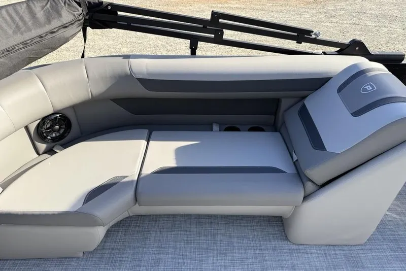 Slide: The Image of Luxurious seating on 2026 Premier 220 Sunscape RF boat, featuring sleek gray upholstery. - 22