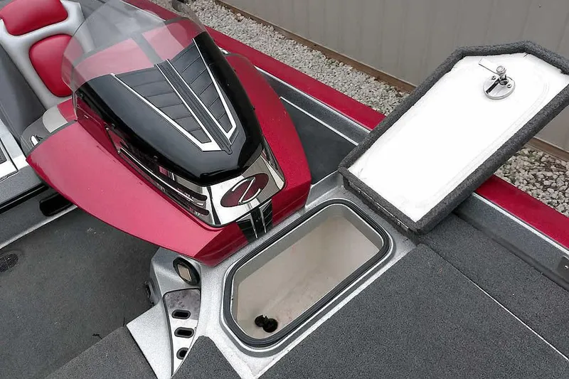 Slide: The Image of 2015 Ranger Z521C Ranger Cup Equipped boat interior with storage compartment open. - 22