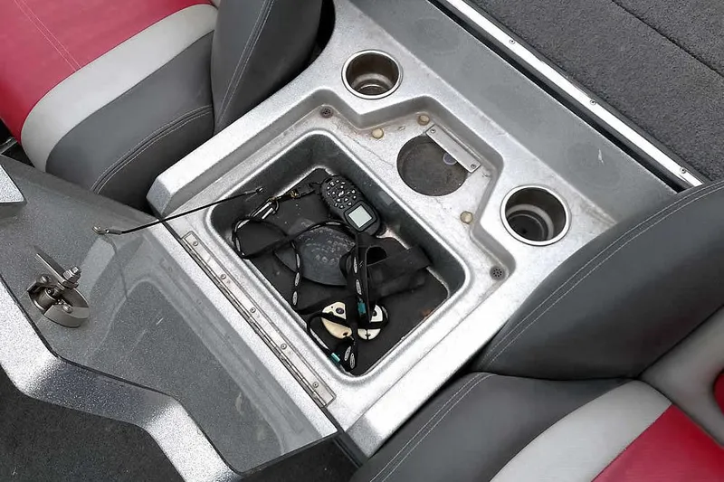 Slide: The Image of 2015 Ranger Z521C Ranger Cup boat console with storage, cup holders, and accessories. - 27