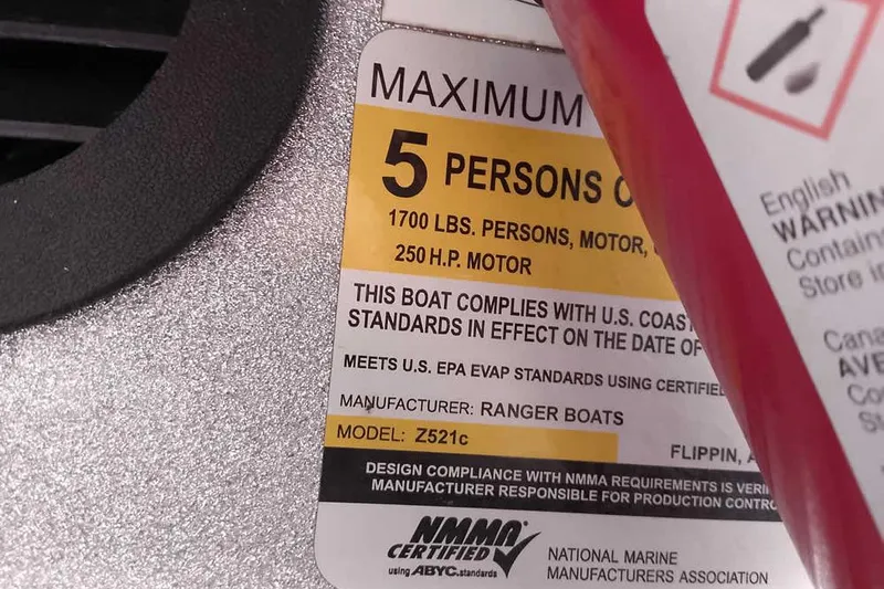 Slide: The Image of 2015 Ranger Z521C capacity label, 5 persons, 1700 lbs, 250 HP motor. - 31