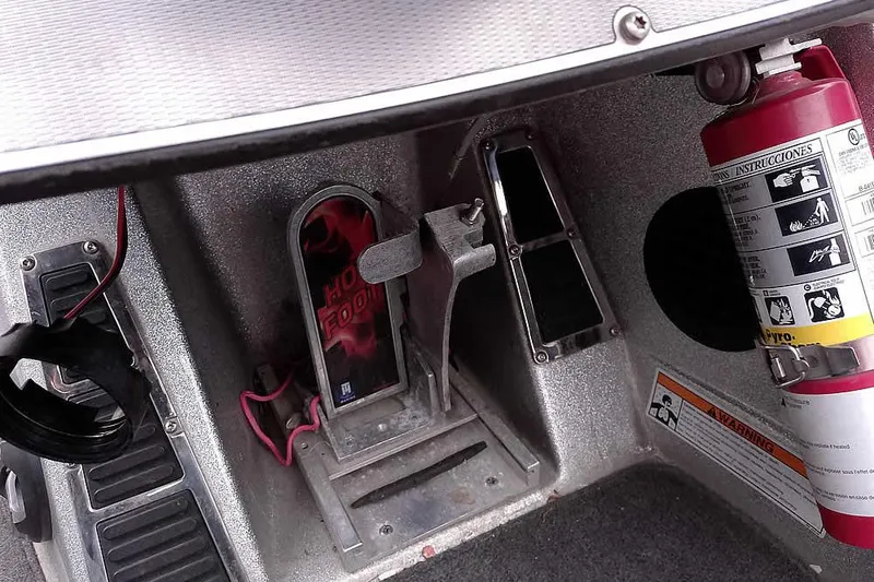 Slide: The Image of 2015 Ranger Z521C Ranger Cup Equipped boat interior with foot pedal and fire extinguisher. - 32