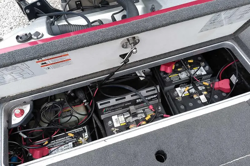 Slide: The Image of 2015 Ranger Z521C Ranger Cup Equipped boat battery compartment with multiple batteries and wiring. - 41