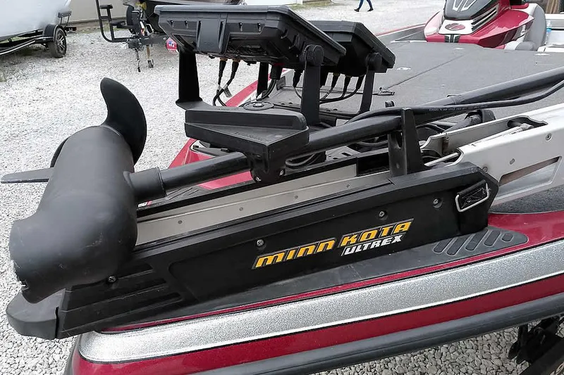 Slide: The Image of 2015 Ranger Z521C boat with Minn Kota Ultrex trolling motor on gravel surface. - 8