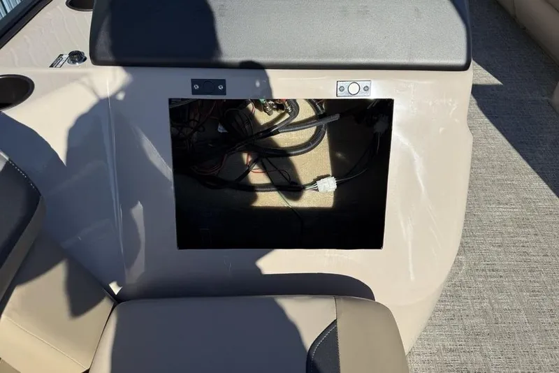Slide: The Image of Interior view of 2026 Premier 220 Sunscape RF XLC boat, showing wiring compartment. - 13