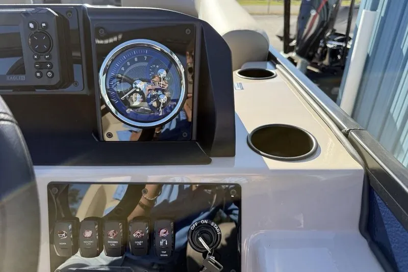 Slide: The Image of Dashboard of 2026 Premier 220 Sunscape RF XLC boat with gauges and controls. - 23
