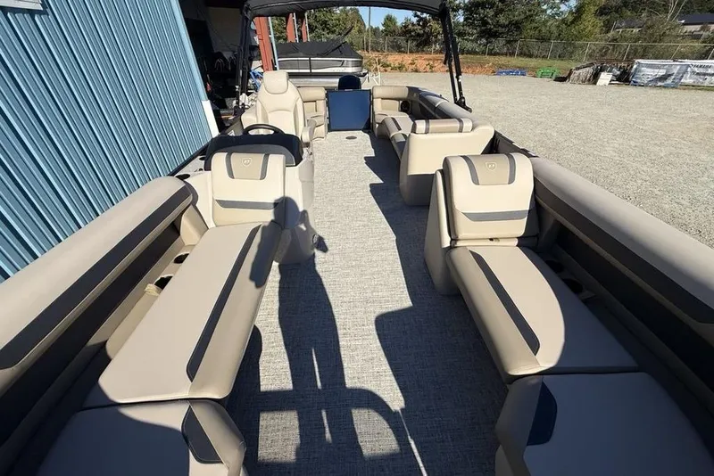 Slide: The Image of 2026 Premier 220 Sunscape RF XLC pontoon boat with spacious seating and modern design. - 33