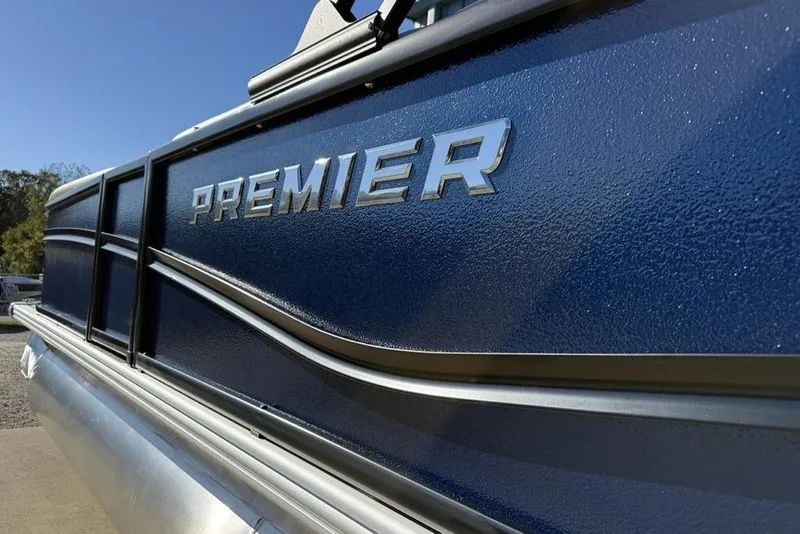 Slide: The Image of 2026 Premier 220 Sunscape RF XLC pontoon boat with sleek blue exterior. - 6