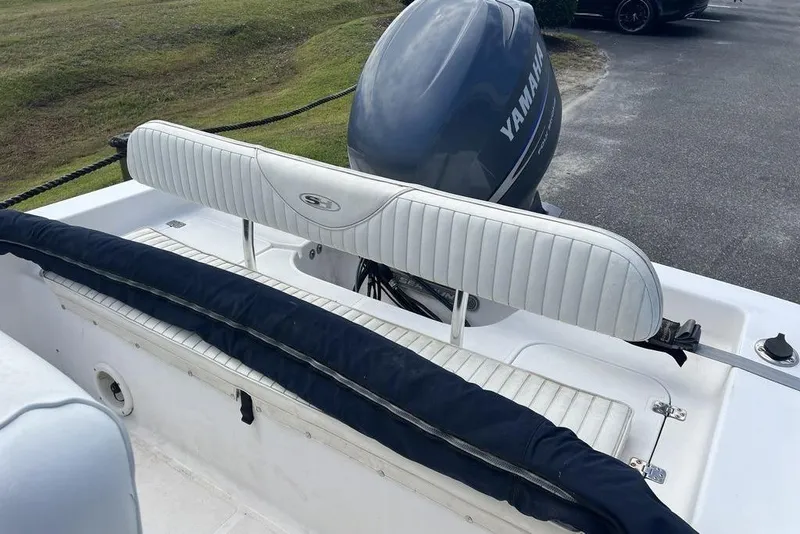 Slide: The Image of 2007 Sea Hunt BX 22 T boat with Yamaha outboard motor, featuring white seating. - 17