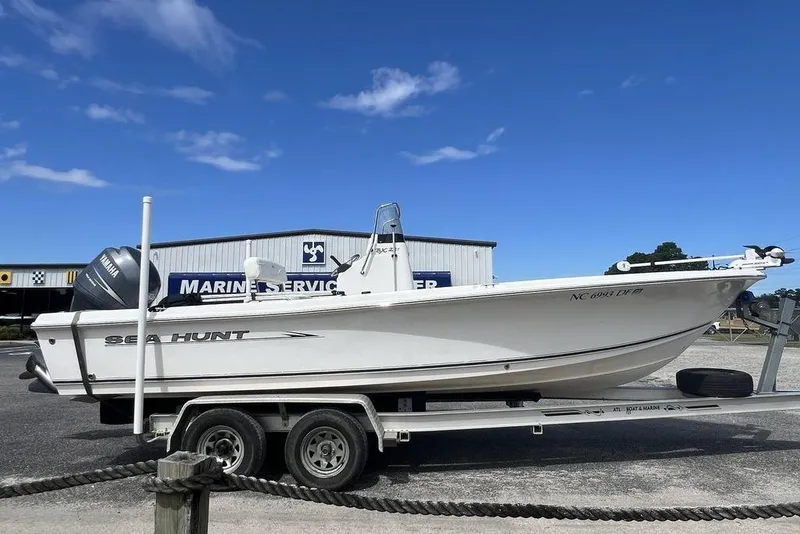 Slide: The Image of 2007 Sea Hunt BX 22 T boat on trailer at marine service center. - 4