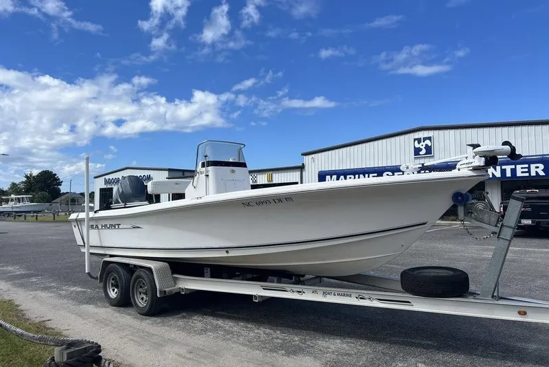 Slide: The Image of 2007 Sea Hunt BX 22 T boat on trailer at marine service center. - 8