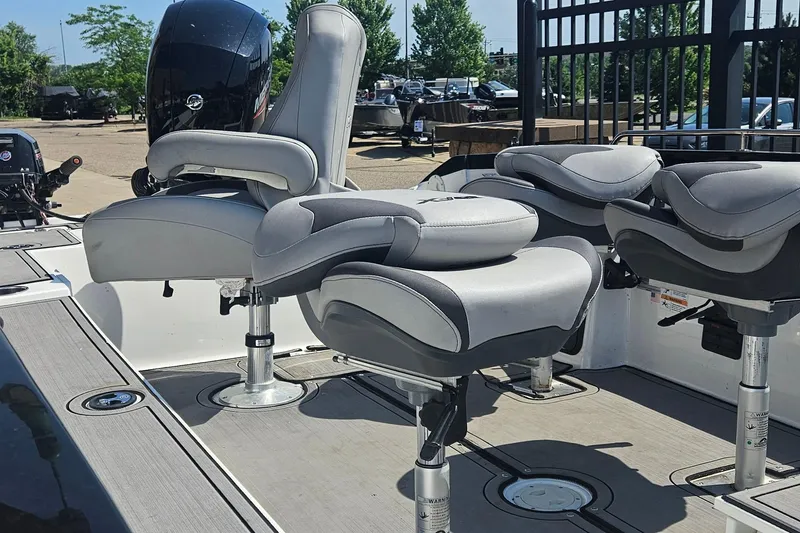 Slide: The Image of 2020 Larson FX 2020 Tiller boat interior with comfortable seating and modern design. - 2