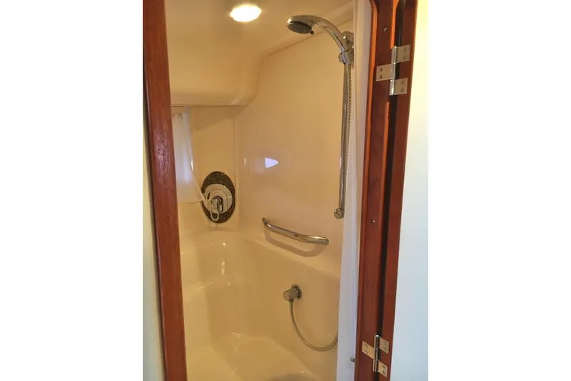 Slide: The Image of Shower area inside 2005 Sea Ray 420 Sundancer yacht, featuring modern fixtures. - 45