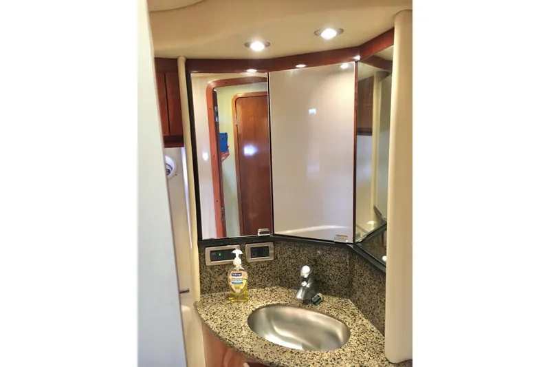 Slide: The Image of Luxurious bathroom interior of 2005 Sea Ray 420 Sundancer yacht with granite countertop. - 46