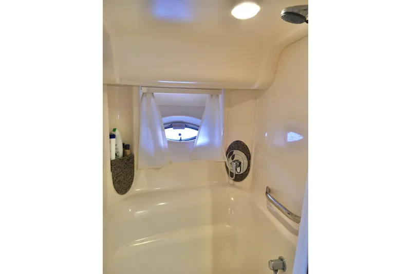Slide: The Image of Bathroom interior of 2005 Sea Ray 420 Sundancer yacht with shower and porthole window. - 50