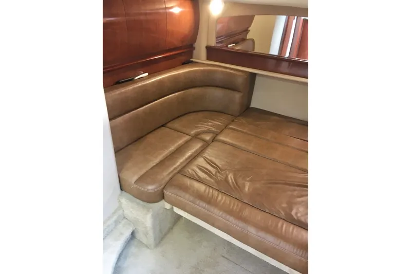 Slide: The Image of Luxurious leather seating in 2005 Sea Ray 420 Sundancer cabin interior. - 53