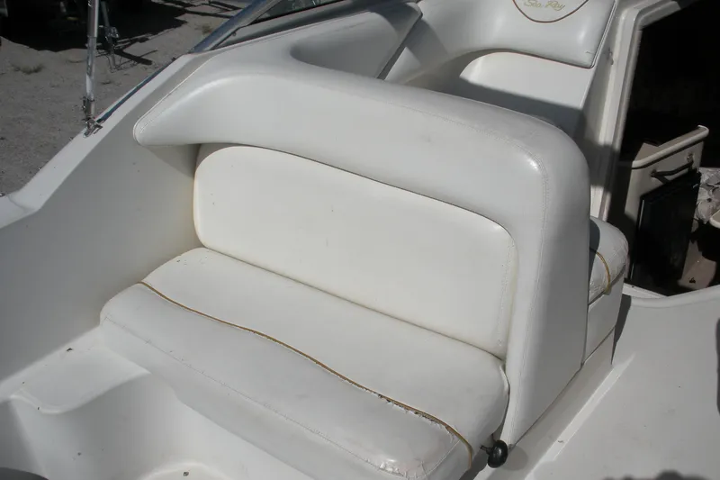 Slide: The Image of White seating area on a 2000 Sea Ray 240 Sundancer boat. - 11