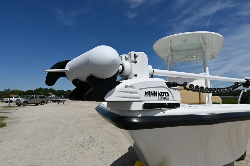 Slide: The Image of Minn Kota Terrova motor on 2023 Clark Sound 24 boat under clear blue sky. - 11