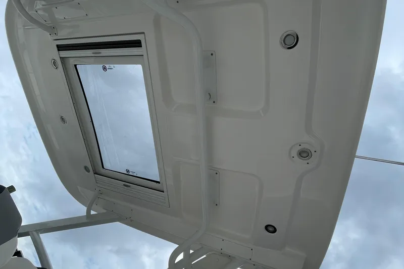 Slide: The Image of 2023 Chaparral 280 OSX boat roof with skylight and recessed lighting. - 29
