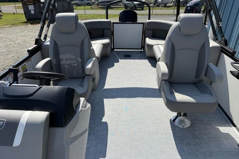 Slide: The Image of 2026 Premier 220 Sunscape RF boat interior with plush seating and modern design. - 12