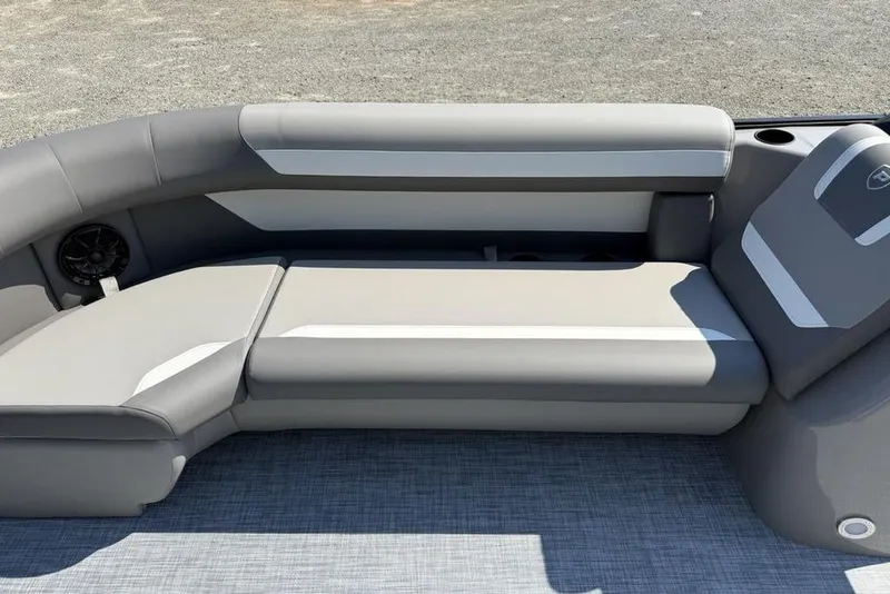 Slide: The Image of 2026 Premier 220 Sunscape RF boat interior with gray seating and cup holders. - 4