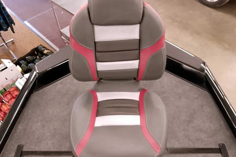 Slide: The Image of 2026 Ranger RT188P boat seat with gray, white, and red accents on a carpeted deck. - 14
