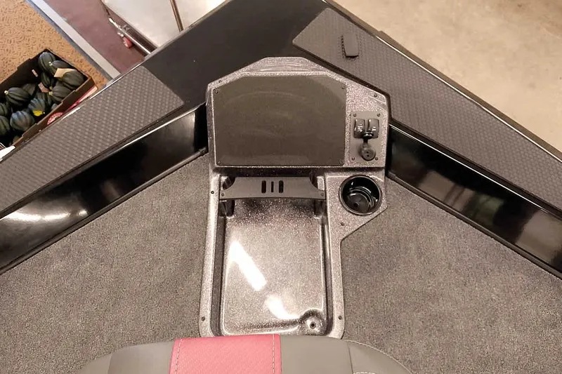 Slide: The Image of 2026 Ranger RT188P boat dashboard with control panel and cup holder. - 15