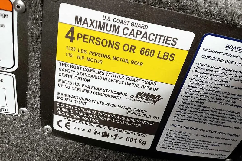 Slide: The Image of 2026 Ranger RT188P capacity label, U.S. Coast Guard compliant, 4 persons or 660 lbs, 115 HP motor. - 19