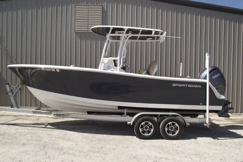 The Image of 2022 Sportsman Open 232 Center Console boat on trailer. - 0
