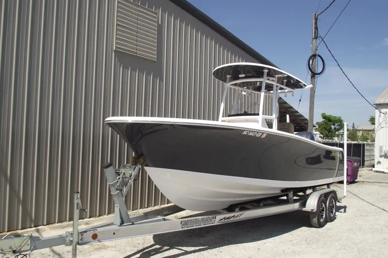 Slide: The Image of 2022 Sportsman Open 232 Center Console boat on trailer. - 1