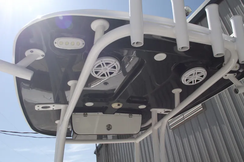 Slide: The Image of 2022 Sportsman Open 232 Center Console T-top with rod holders and speakers. - 28