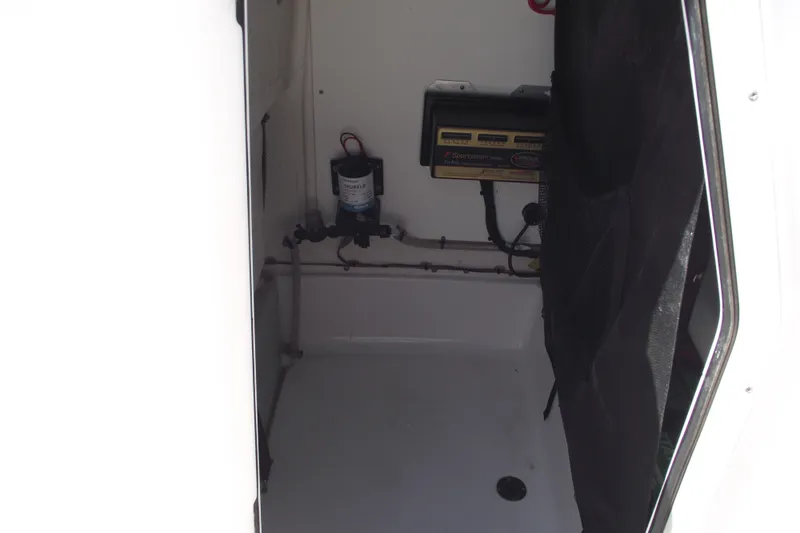 Slide: The Image of Interior view of 2022 Sportsman Open 232 Center Console boat compartment. - 40
