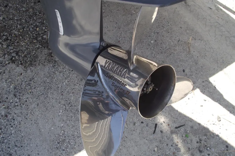 Slide: The Image of Propeller of a 2022 Sportsman Open 232 Center Console with Yamaha Saltwater Series. - 5