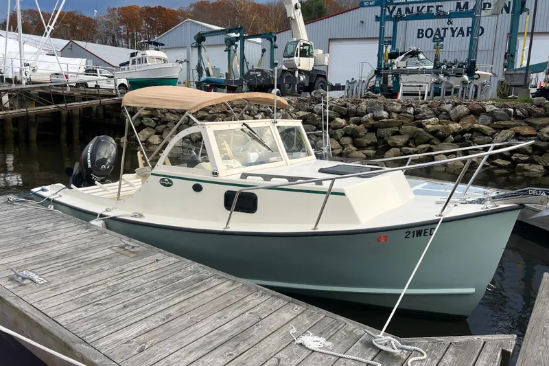 The Image of 2018 Seaway 21 Seafarer Cuddy boat docked at a marina. - 0
