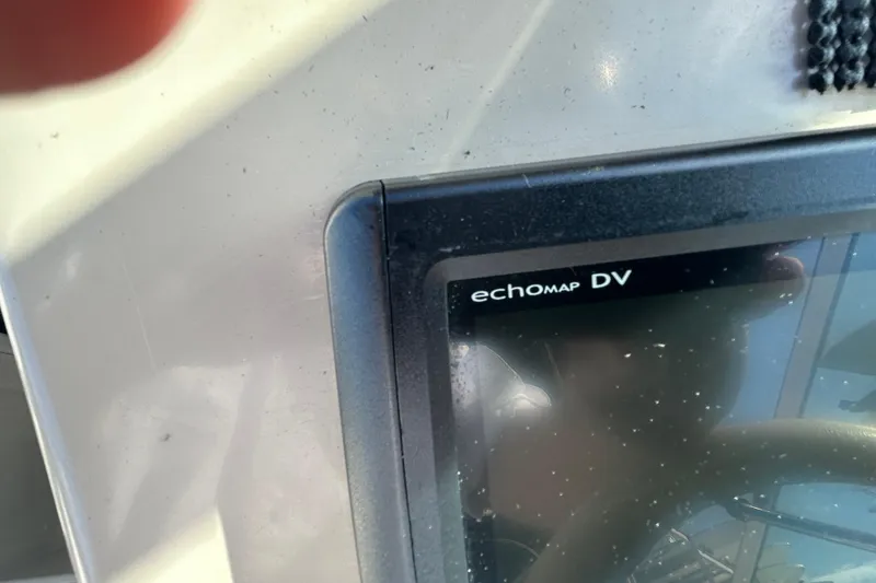 Slide: The Image of Close-up of an EchoMap DV device on a 2000 Rinker 270 Fiesta Vee boat. - 14