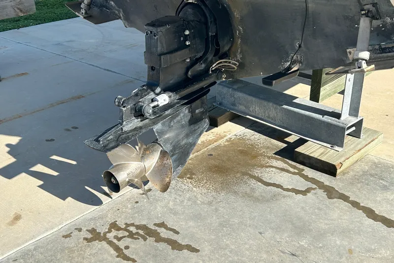 Slide: The Image of Close-up of a 2000 Rinker 270 Fiesta Vee boat propeller on a trailer. - 28