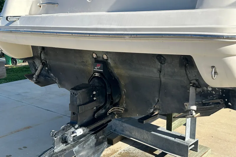 Slide: The Image of Rear view of a 2000 Rinker 270 Fiesta Vee boat on a trailer. - 29