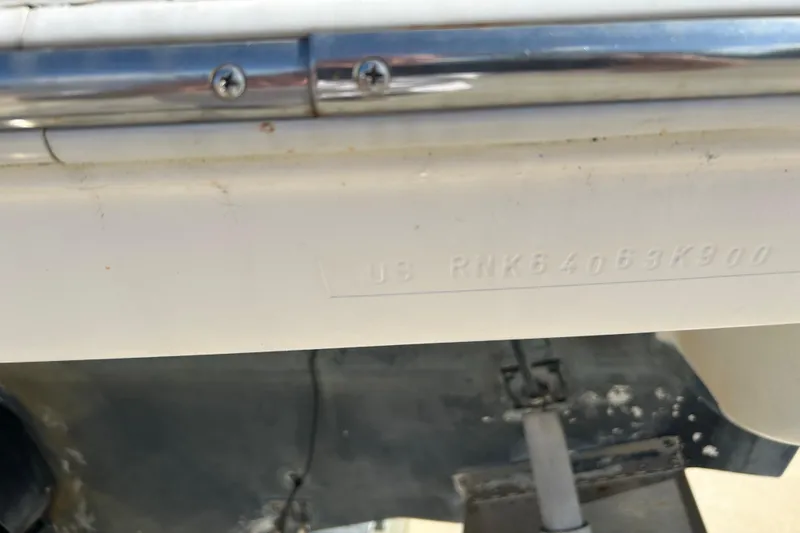 Slide: The Image of Close-up of a 2000 Rinker 270 Fiesta Vee boat hull identification number. - 31