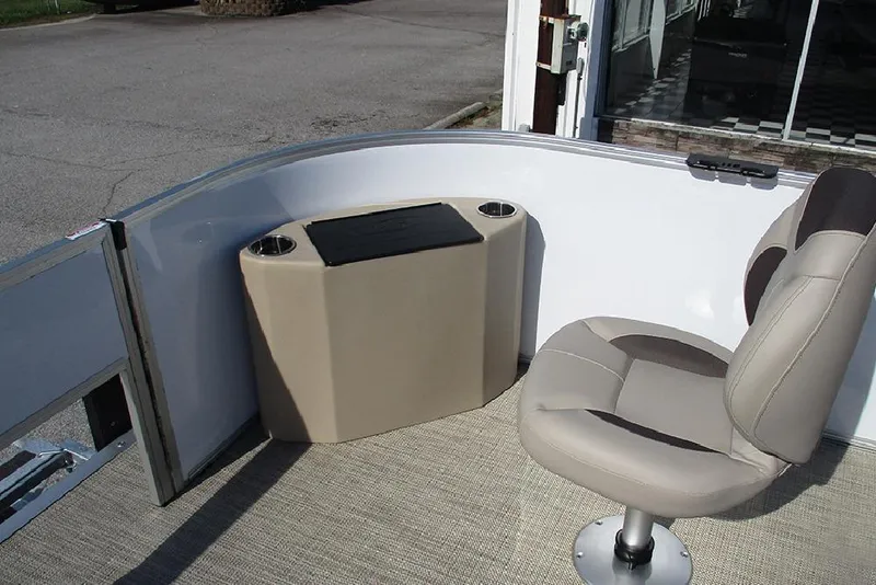 Slide: The Image of 2026 Bentley Pontoons 243 Fish CWT interior with seating and storage compartment. - 14