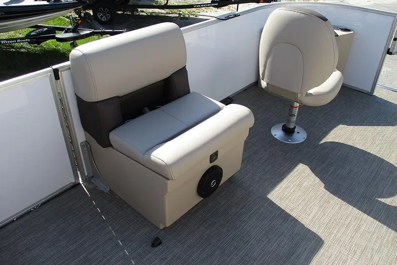 Slide: The Image of 2026 Bentley Pontoons 243 Fish CWT interior seating with beige upholstery. - 21