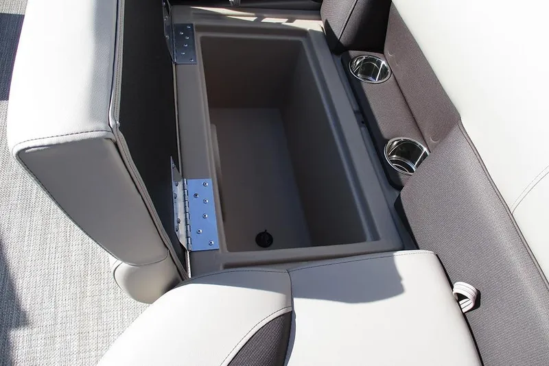 Slide: The Image of 2026 Bentley Pontoons 243 Fish CWT storage compartment with cup holders and cushioned seating. - 28