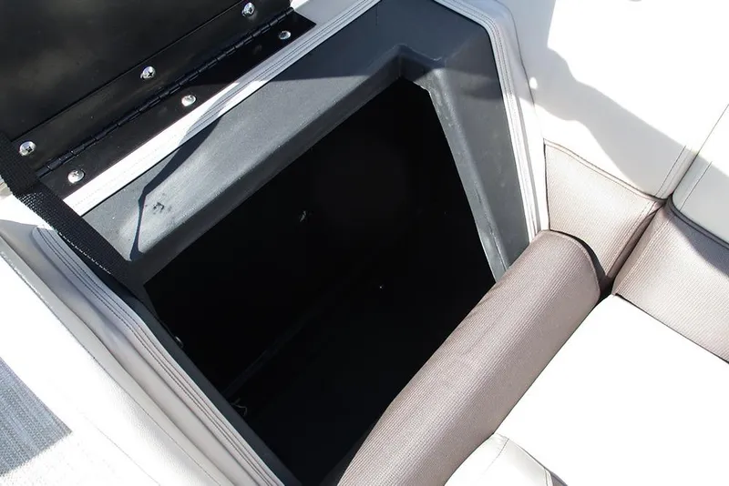 Slide: The Image of Storage compartment in 2026 Bentley Pontoons 243 Fish CWT boat, featuring cushioned seating. - 29