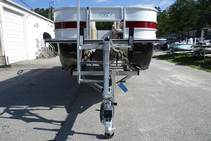 Slide: The Image of 2026 Bentley Pontoons 243 Fish CWT on trailer, parked outdoors. - 4