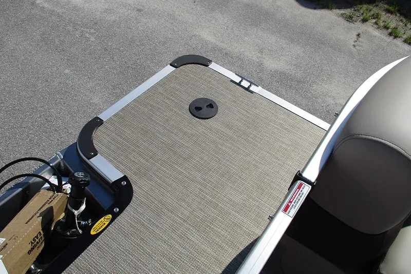 Slide: The Image of Bentley Pontoons 243 Fish CWT 2026 deck with beige flooring and seating. - 40