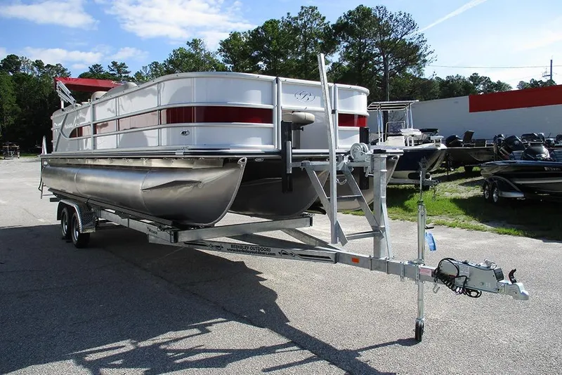 Slide: The Image of 2026 Bentley Pontoons 243 Fish CWT on trailer, parked outdoors. - 5