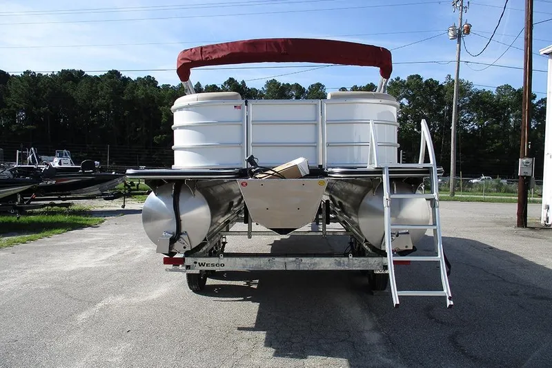 Slide: The Image of 2026 Bentley Pontoons 243 Fish CWT on trailer, rear view with ladder and canopy. - 8