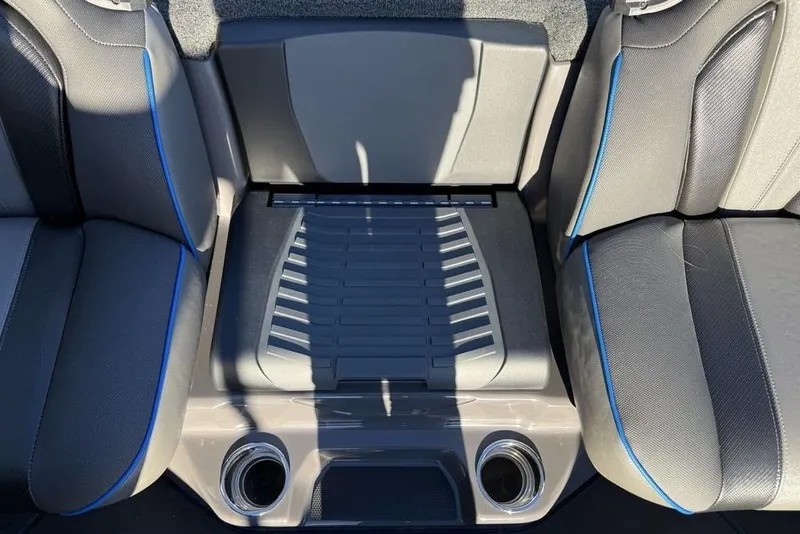 Slide: The Image of 2026 Skeeter FXR20 Apex boat interior with gray seats and blue accents. - 16