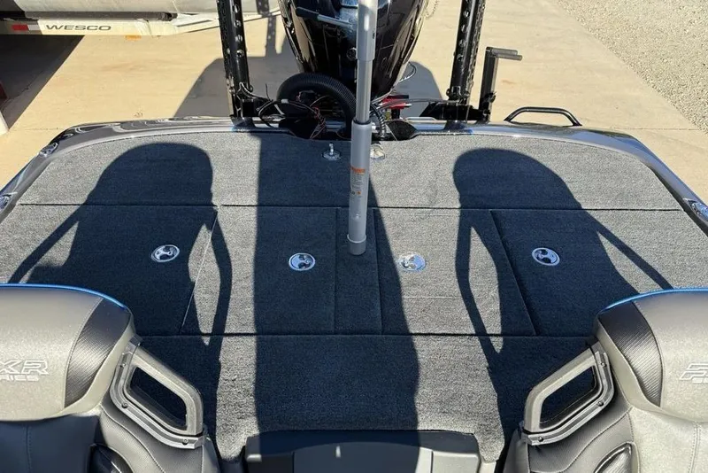 Slide: The Image of 2026 Skeeter FXR20 Apex boat deck with shadows and seating detail. - 18