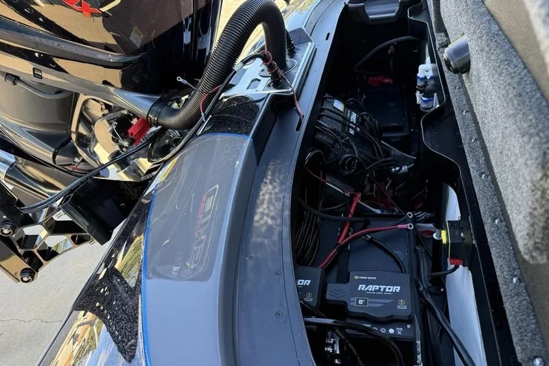 Slide: The Image of 2026 Skeeter FXR20 Apex boat engine compartment with Raptor power system and wiring. - 22